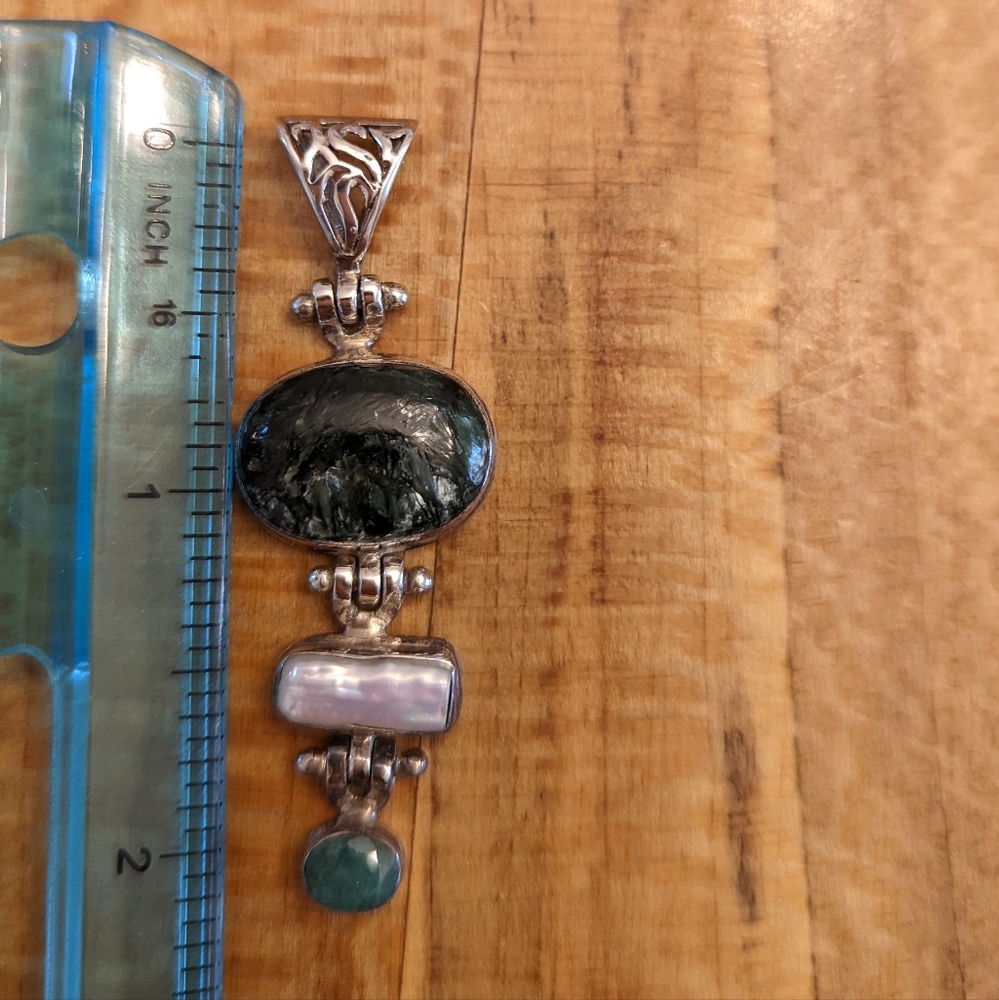 Green and sterling silver pendant